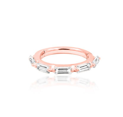 Junipurr Annie solid 14k gold baguette White CZ clicker ring, product view.