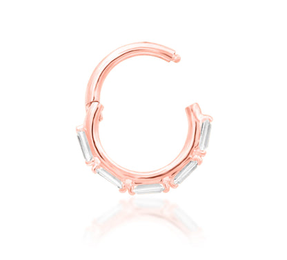 Junipurr Annie solid 14k gold clicker ring with five forward-facing baguette White CZ stones, product view.