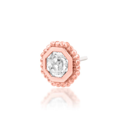 Junipurr Arleth solid 14k rose gold octagon White CZ threadless end, angled view.