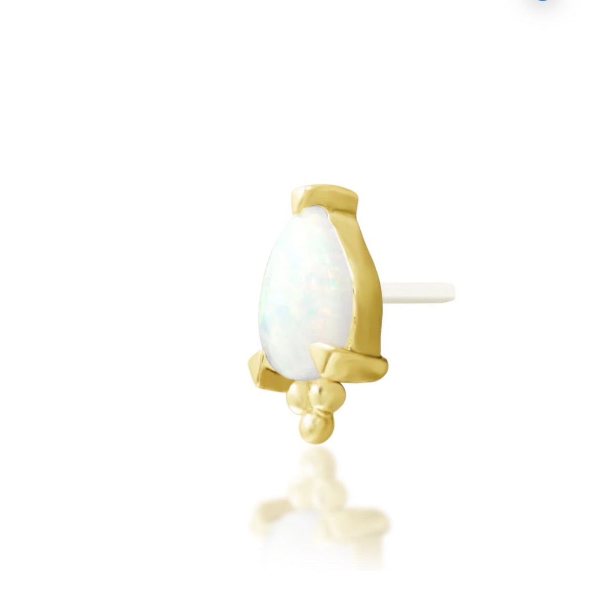 Junipurr Artemis solid 14k yellow gold pear synthetic opal threadless end with beaded detail, angled view.