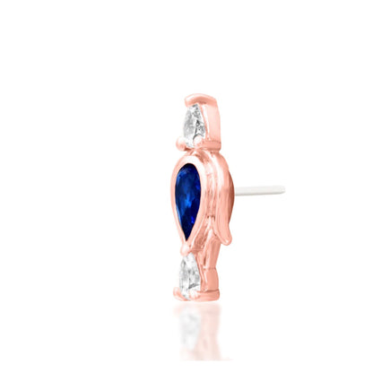 Junipurr Augusta blue cubic zirconia threadless end in 14k rose gold angled view for helix and lobe piercings