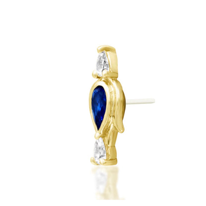 Junipurr Augusta blue cubic zirconia threadless end in 14k yellow gold angled view for helix and conch piercings