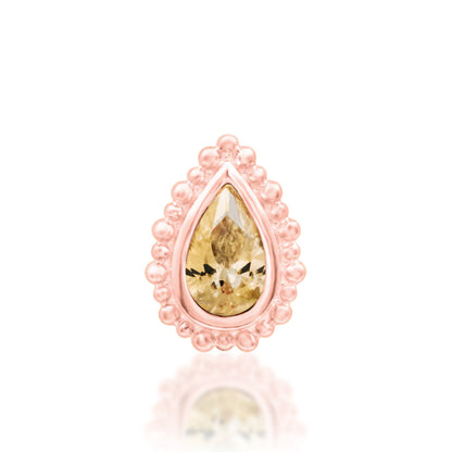 Junipurr Avani solid 14k rose gold pear-cut Champagne CZ threadless end, front view.