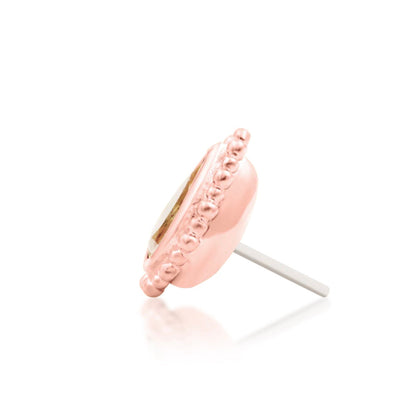 Junipurr Avani solid 14k rose gold pear-cut Champagne CZ threadless end, side profile.