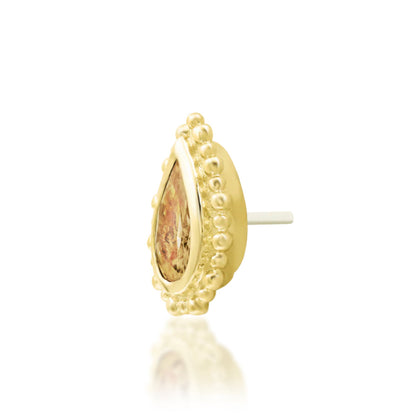 Junipurr Avani solid 14k yellow gold pear-cut Champagne CZ threadless end, angled view.