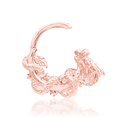 Junipurr Azure solid 14k rose gold dragon clicker ring, angled view.