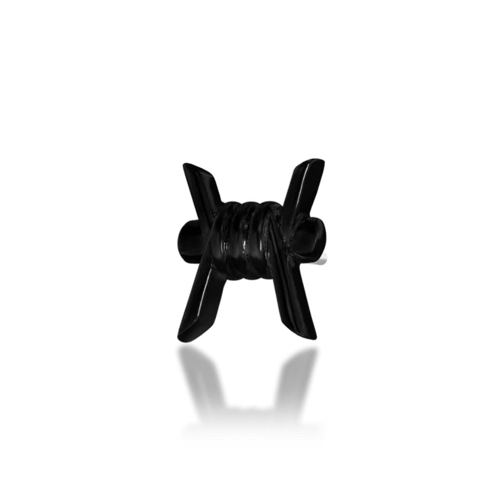 Junipurr Barb-ara solid 14k gold black-rhodium barbed-wire threadless end, angled view.