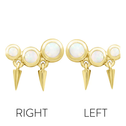 Close product view of Junipurr Blake in solid 14k yellow gold showing three graduated opals and polished spike details.