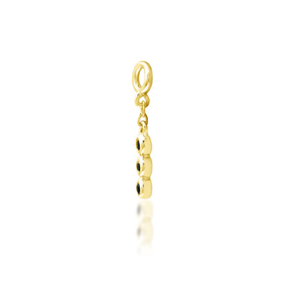 Junipurr Cohen solid 14k yellow gold Black CZ hanging charm, angled view.