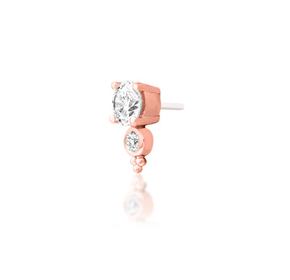 Junipurr Ecstatic solid 14k rose gold threadless end with two graduated lab-grown diamonds, angled view.