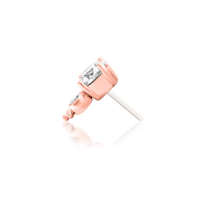 Close product view of Junipurr Ecstatic in solid 14k rose gold showing the graduated lab-grown diamonds and beaded gold detail.