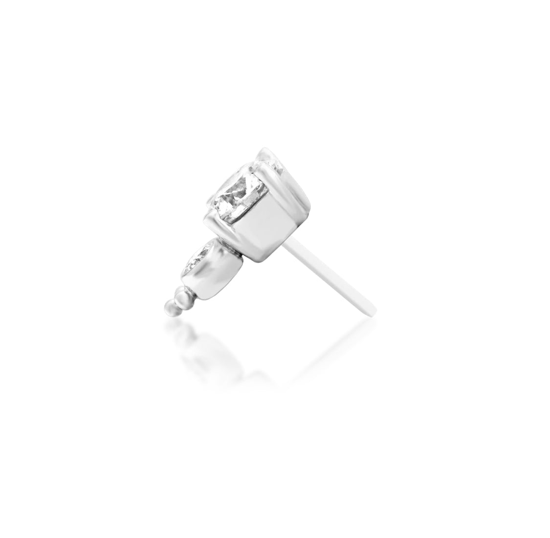 Close product view of Junipurr Ecstatic in solid 14k white gold showing the graduated lab-grown diamonds and beaded gold detail.