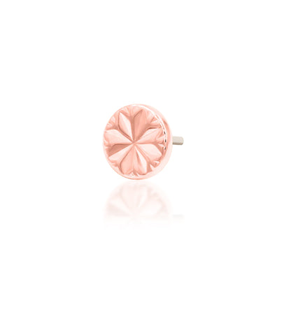 Junipurr Engraved Disk solid 14k rose gold threadless end with engraved star detail, angled view.