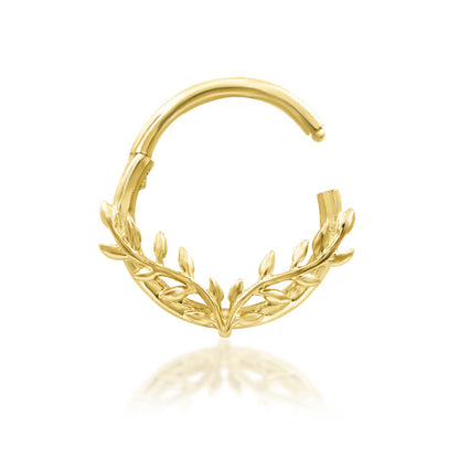 Junipurr Everleigh solid 14k yellow gold sculptural clicker ring, angled view.