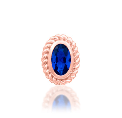 Junipurr Genevive solid 14k gold oval sapphire decorative end with textured gold framing.