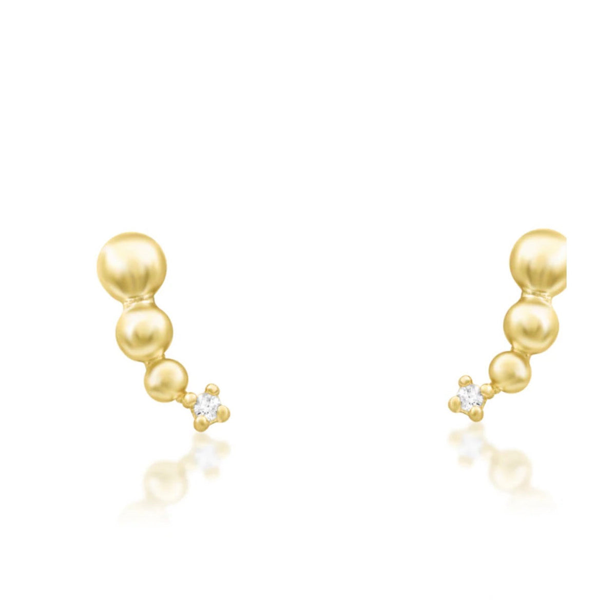 Junipurr Glo solid 14k yellow gold curved White CZ threadless end, detail view.