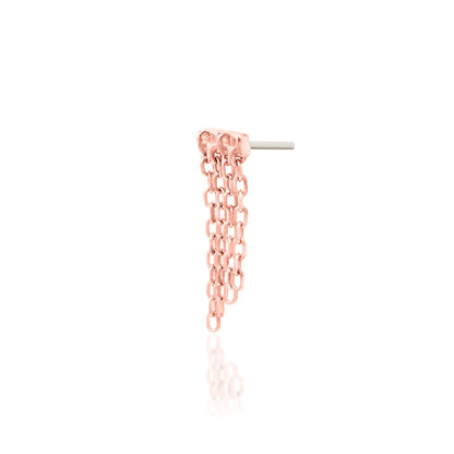 Side detail of Junipurr Imogen in solid 14k rose gold showing the elongated upper setting and cascading chains.
