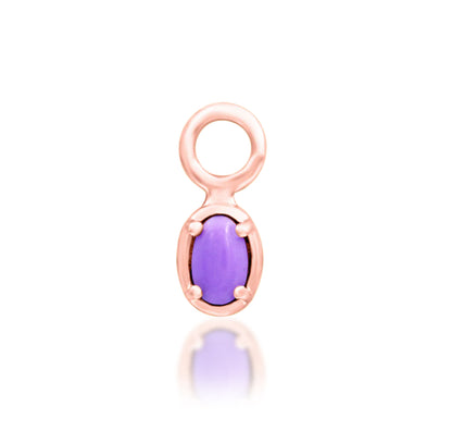 Junipurr Lennox rose gold colour reference image with an oval purple turquoise gemstone; this colour is not currently listed as a live variant.