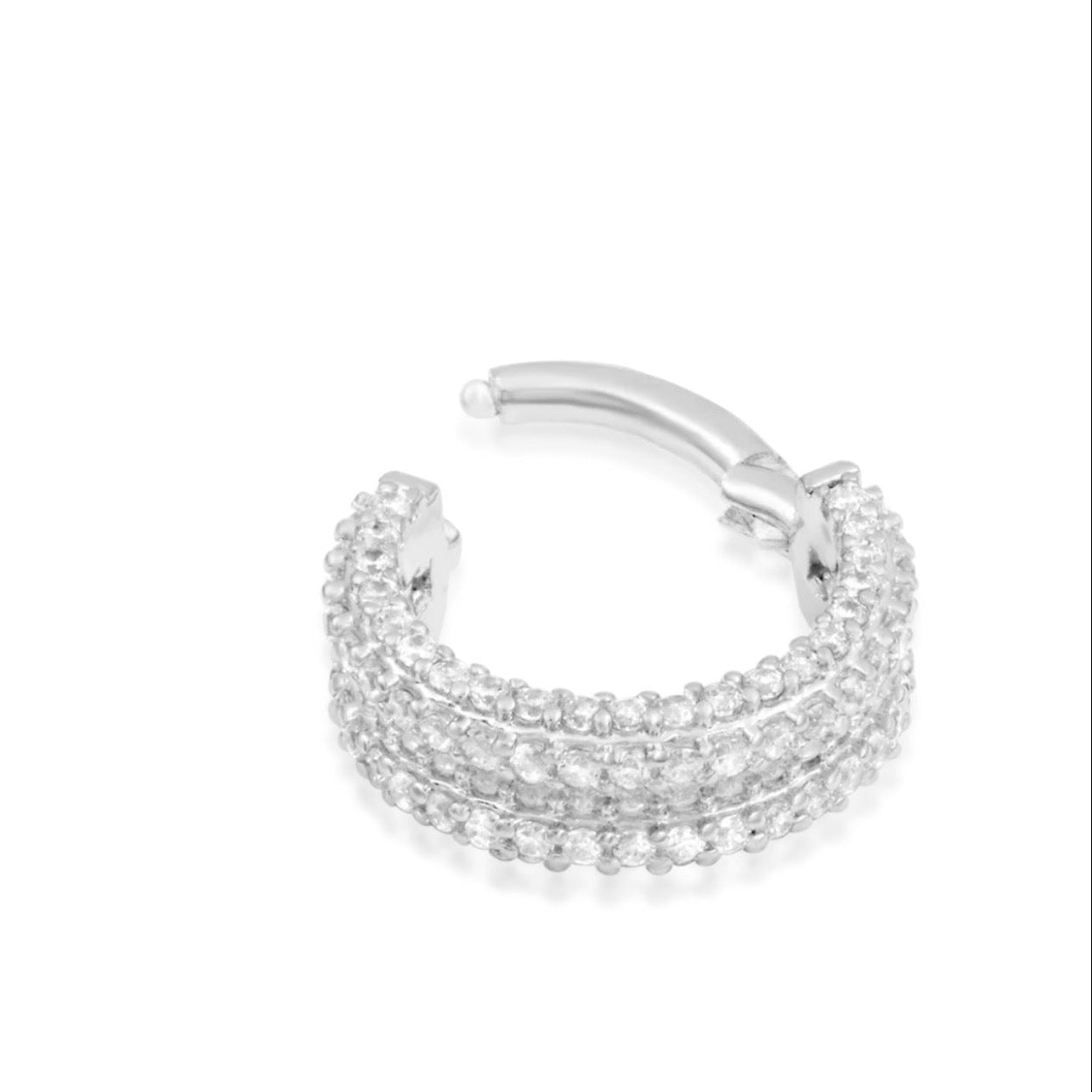 Open white gold Junipurr Mie Mie ring with its broad CZ-covered section and clicker fastening visible.