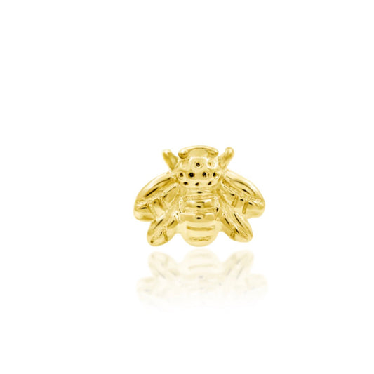 Junipurr Mini Bee solid 14k yellow gold sculpted bee threadless end, angled view.