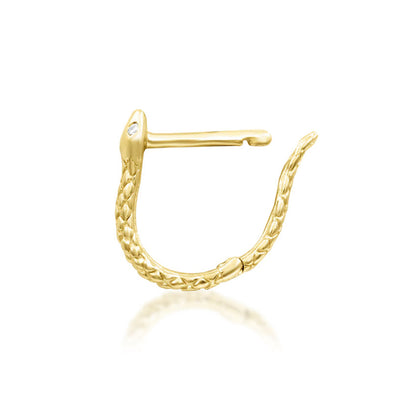 Junipurr Ophis snake huggie earring in solid 14k rose gold with a textured body and two white CZ eyes.