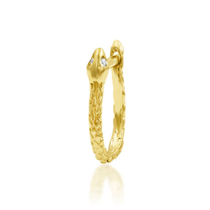 Solid 14k yellow gold Ophis serpent hoop by Junipurr, featuring a curved textured body and white CZ eye details.