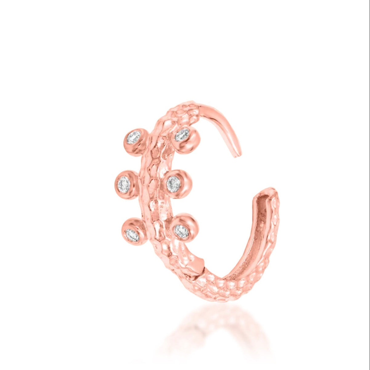 Junipurr Rora solid 14k rose gold textured clicker ring with six cubic zirconia stones, product view.
