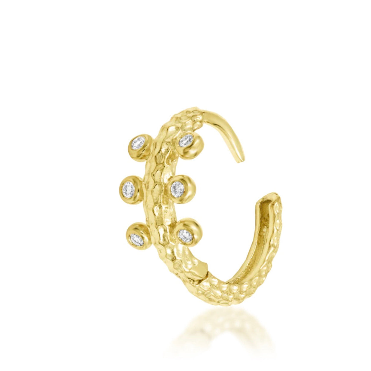 Open yellow gold Junipurr Rora clicker showing its sculpted gold texture and six sparkling cubic zirconia accents.