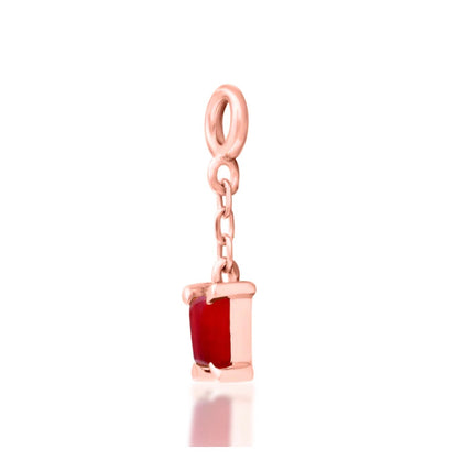 Angled view of Junipurr Salvie carnelian charm in 14k rose gold.
