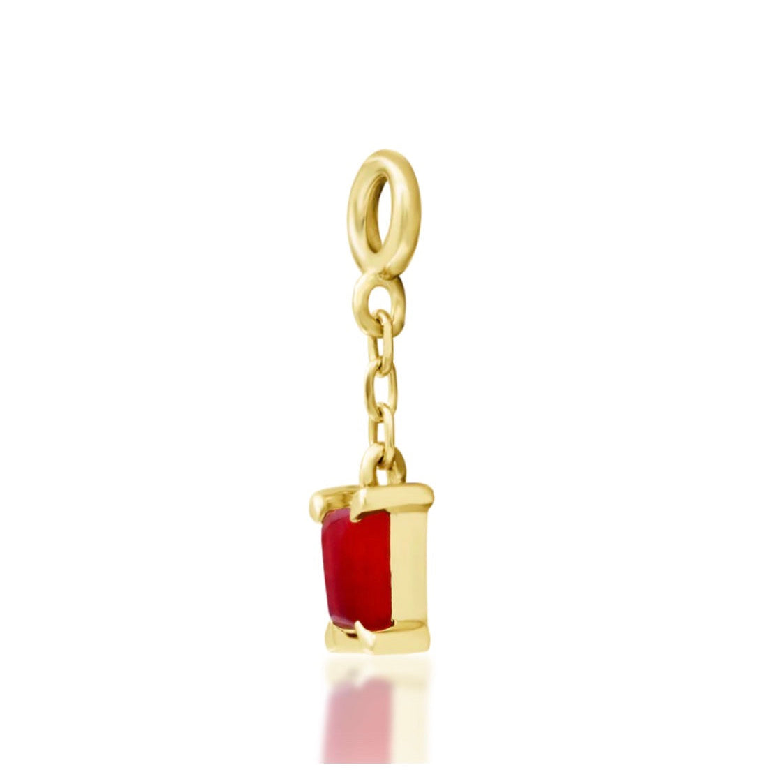 Angled view of Junipurr Salvie carnelian charm in 14k yellow gold.
