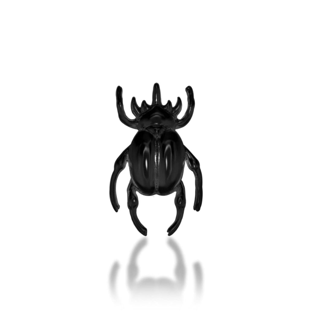 Junipurr Scene Rhino Beetle solid 14k gold black-rhodium threadless end, front view.