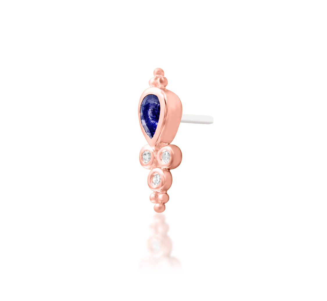 Junipurr Tilda solid 14k rose gold Iolite and White CZ threadless end, angled view.