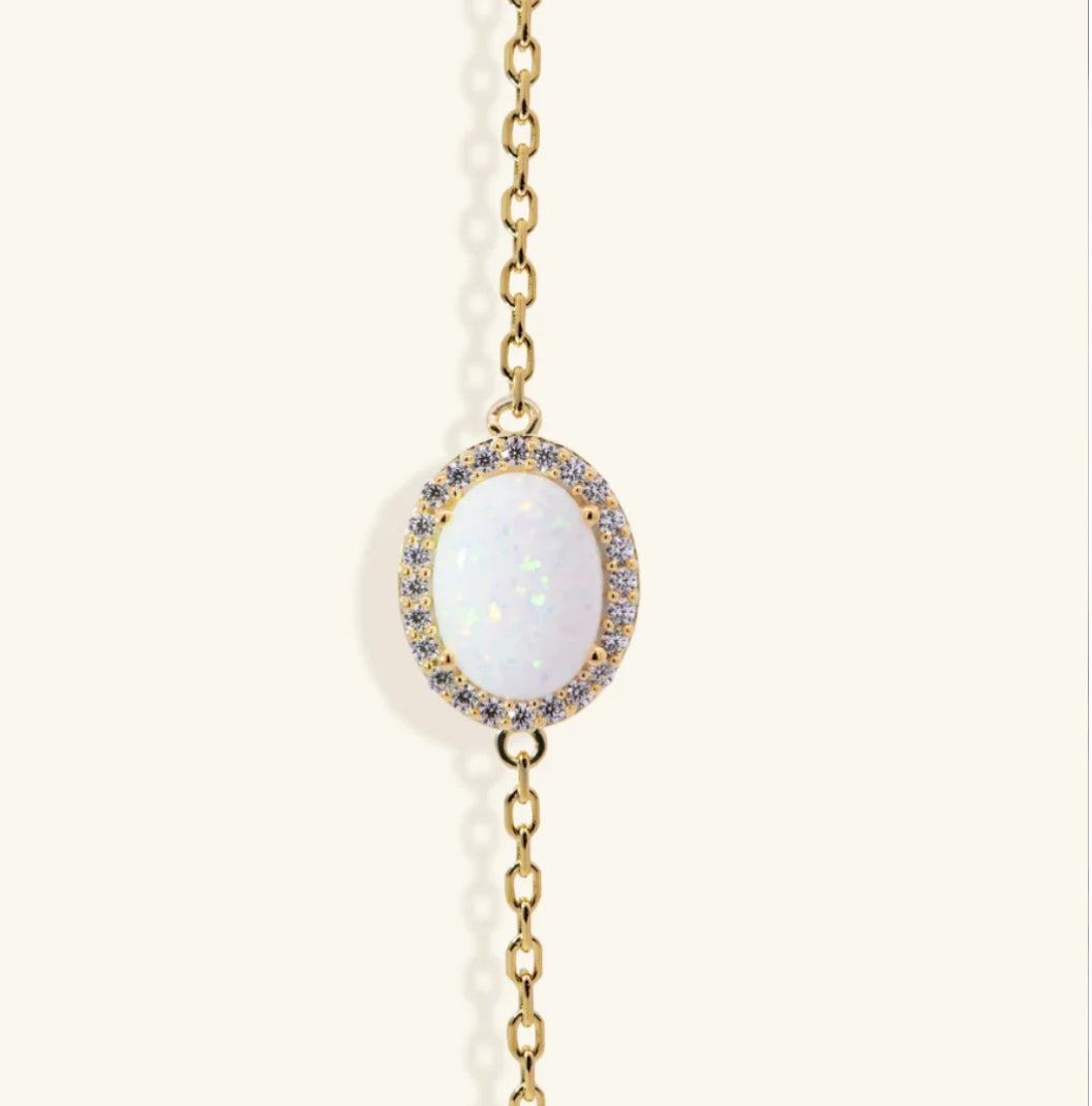 Junipurr Ulora synthetic opal and cubic zirconia halo bracelet, product view.