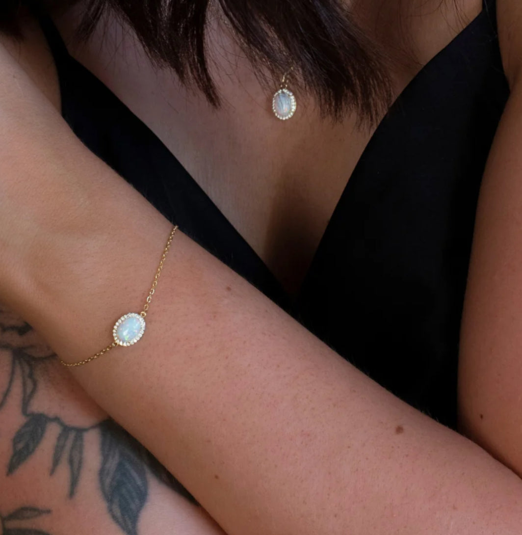 Junipurr Ulora 6mm × 8mm synthetic opal bracelet with CZ accents, product view.