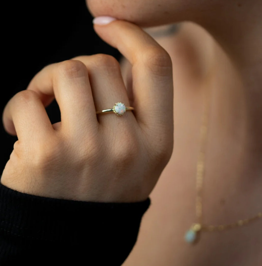 Junipurr Umara minimal synthetic opal ring in a prong setting, product view.
