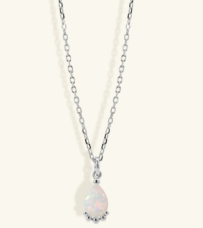 Junipurr Uzira adjustable synthetic opal pendant necklace, product view.