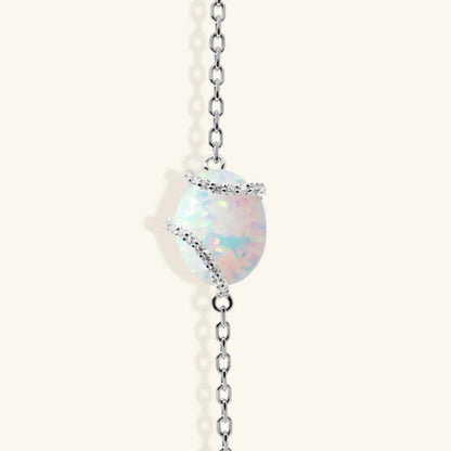 Junipurr Vasara synthetic opal and cubic zirconia bracelet, angled view.