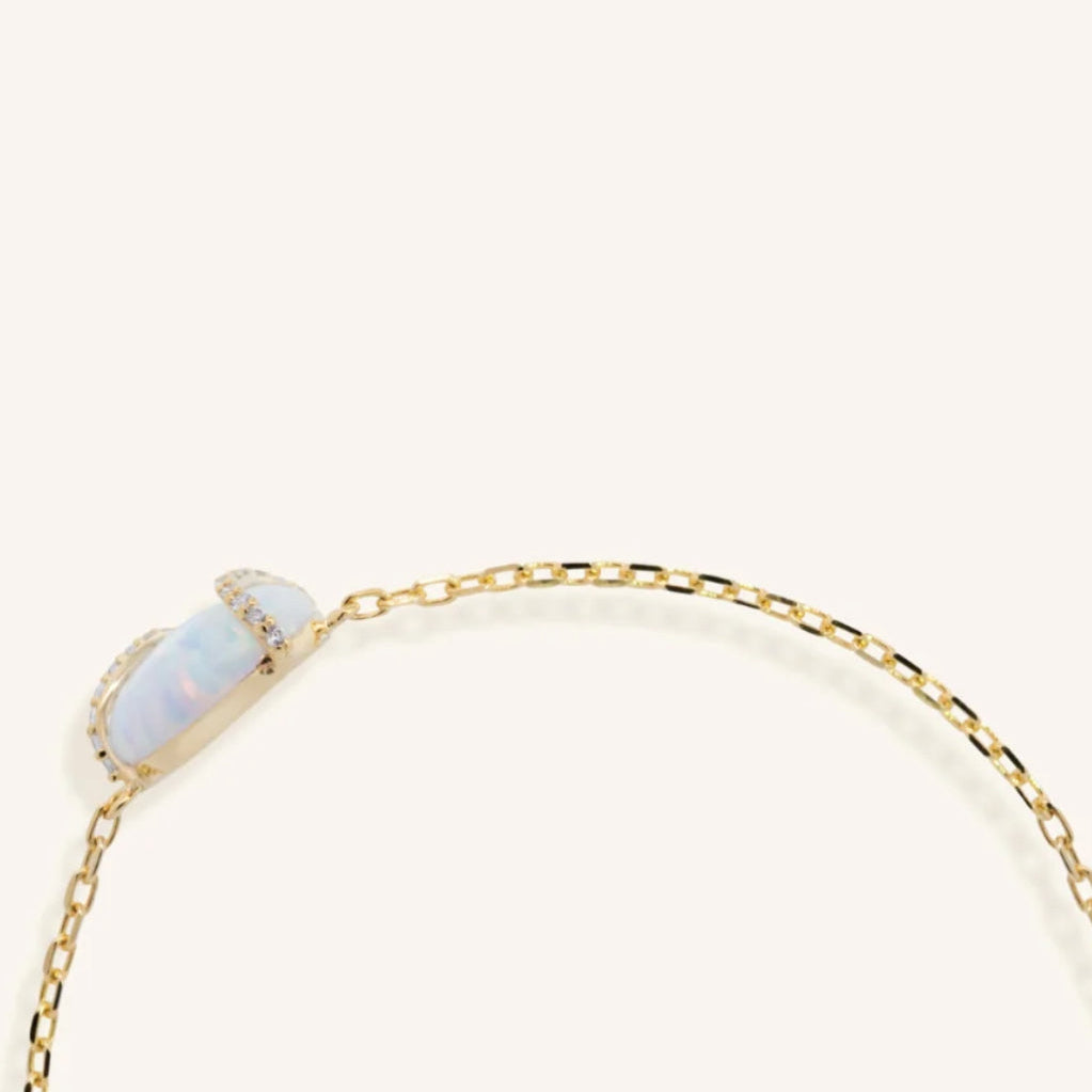 Junipurr Vasara synthetic opal and cubic zirconia bracelet, gemstone detail.