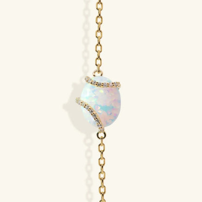 Junipurr Vasara gold vermeil bracelet with synthetic opal and cubic zirconia accents, front view.