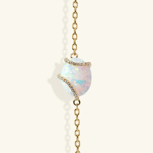 Junipurr Vasara gold vermeil bracelet with synthetic opal and cubic zirconia accents, front view.
