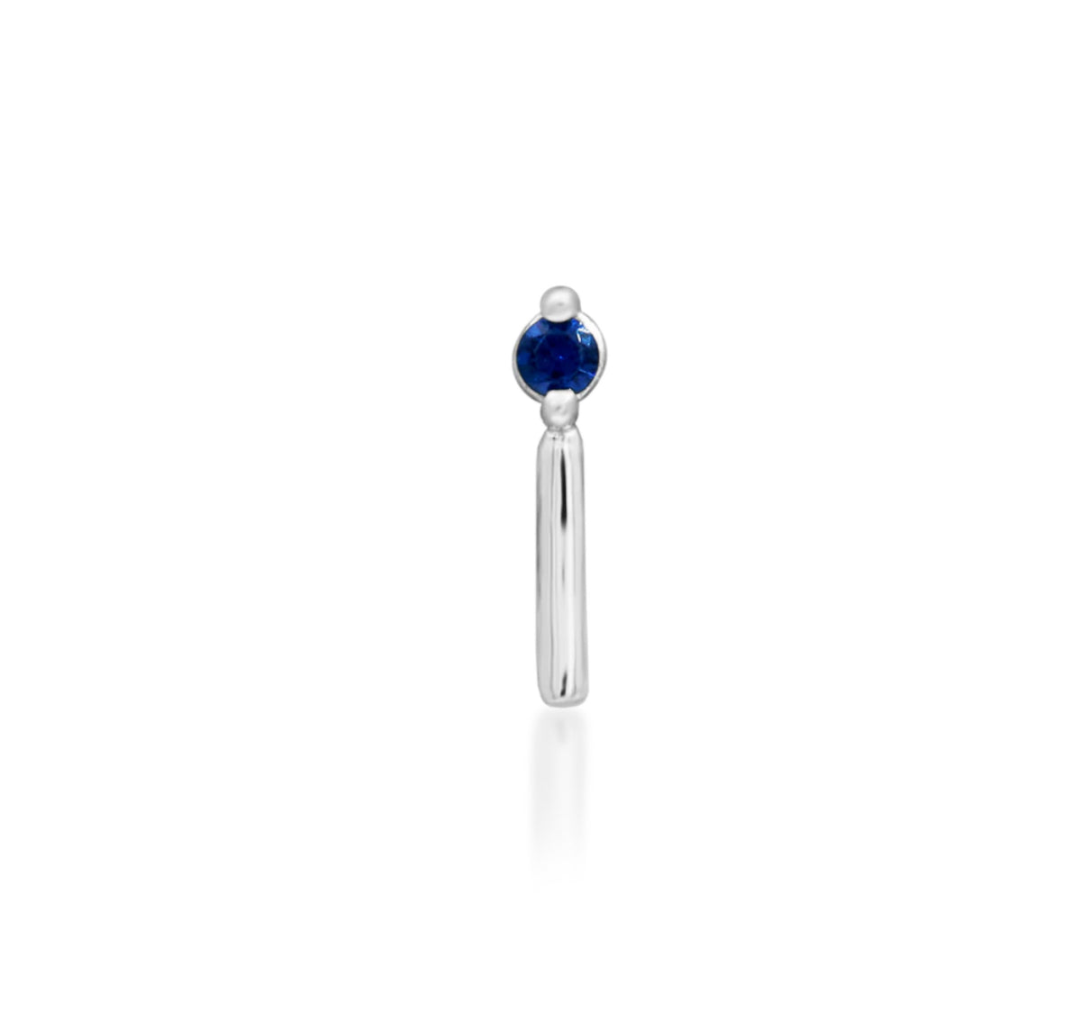 Junipurr Vast solid 14k gold threadless dangle end with blue sapphire, product view.