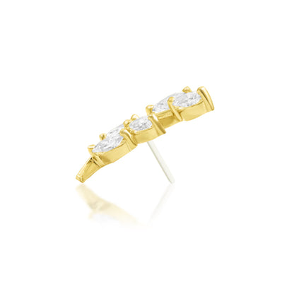 Side profile of the Junipurr Vedia solid gold threadless end showing its elongated curved setting