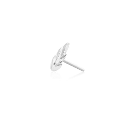 Low-profile botanical cartilage end in solid 14k white gold with a delicate leaf design