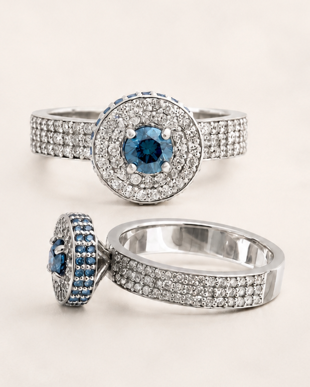 Luxury bespoke engagement rings with diamonds and a blue centre gemstone