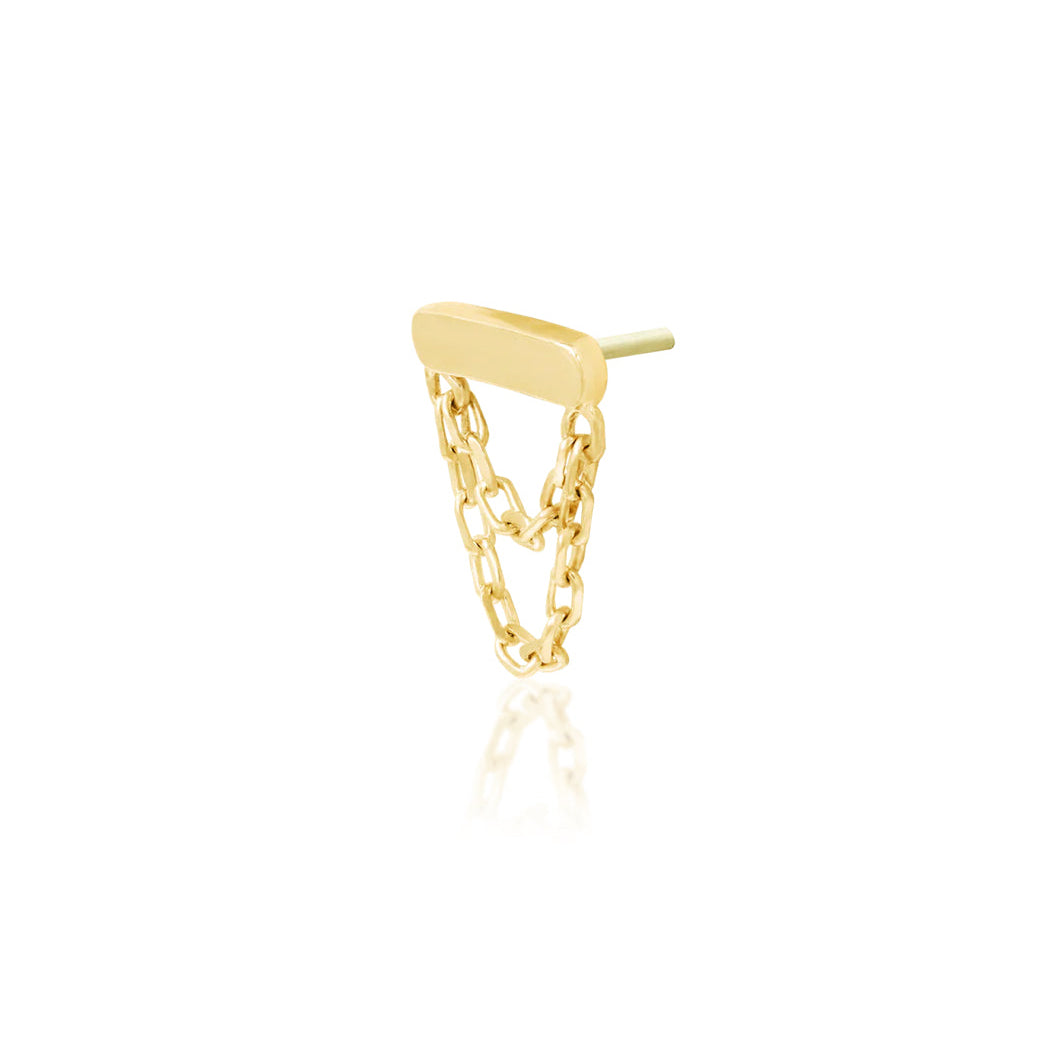 Minimalist cartilage earring in 14k yellow gold combining polished solid gold with delicate chain movement.