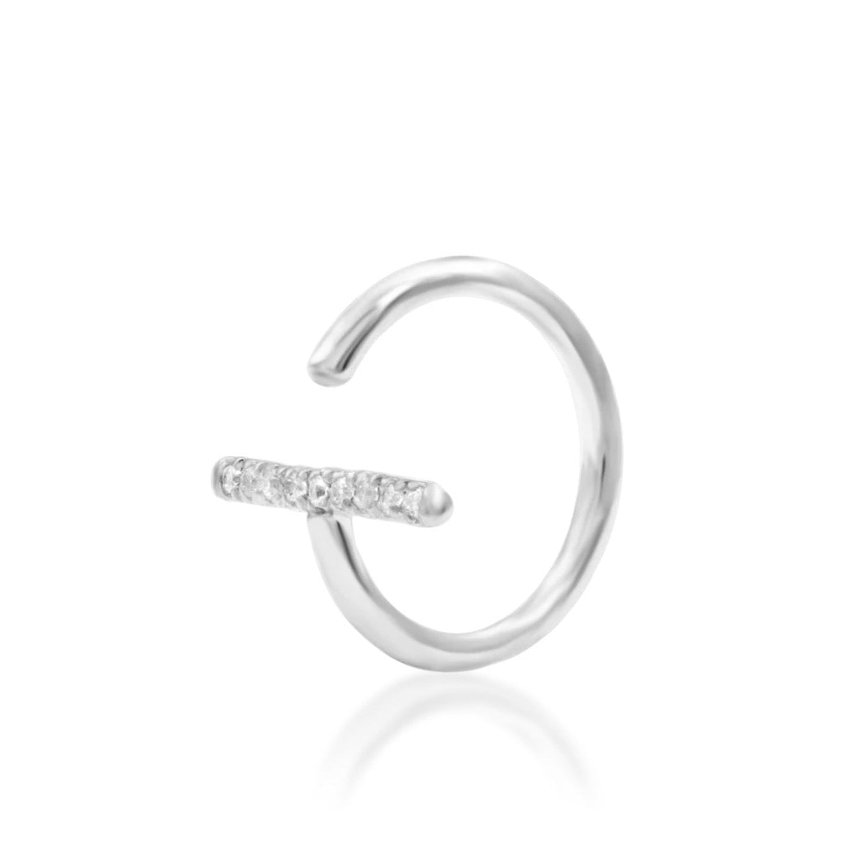 Minimalist crystal jewellery in 14k white gold, with nine white CZ stones forming Xaven’s refined centre line.