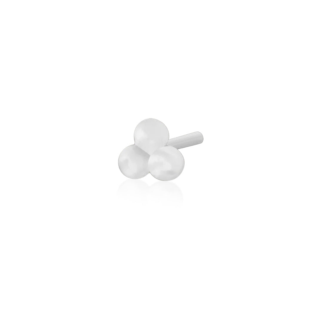 Minimalist white gold tragus earring featuring three polished spheres