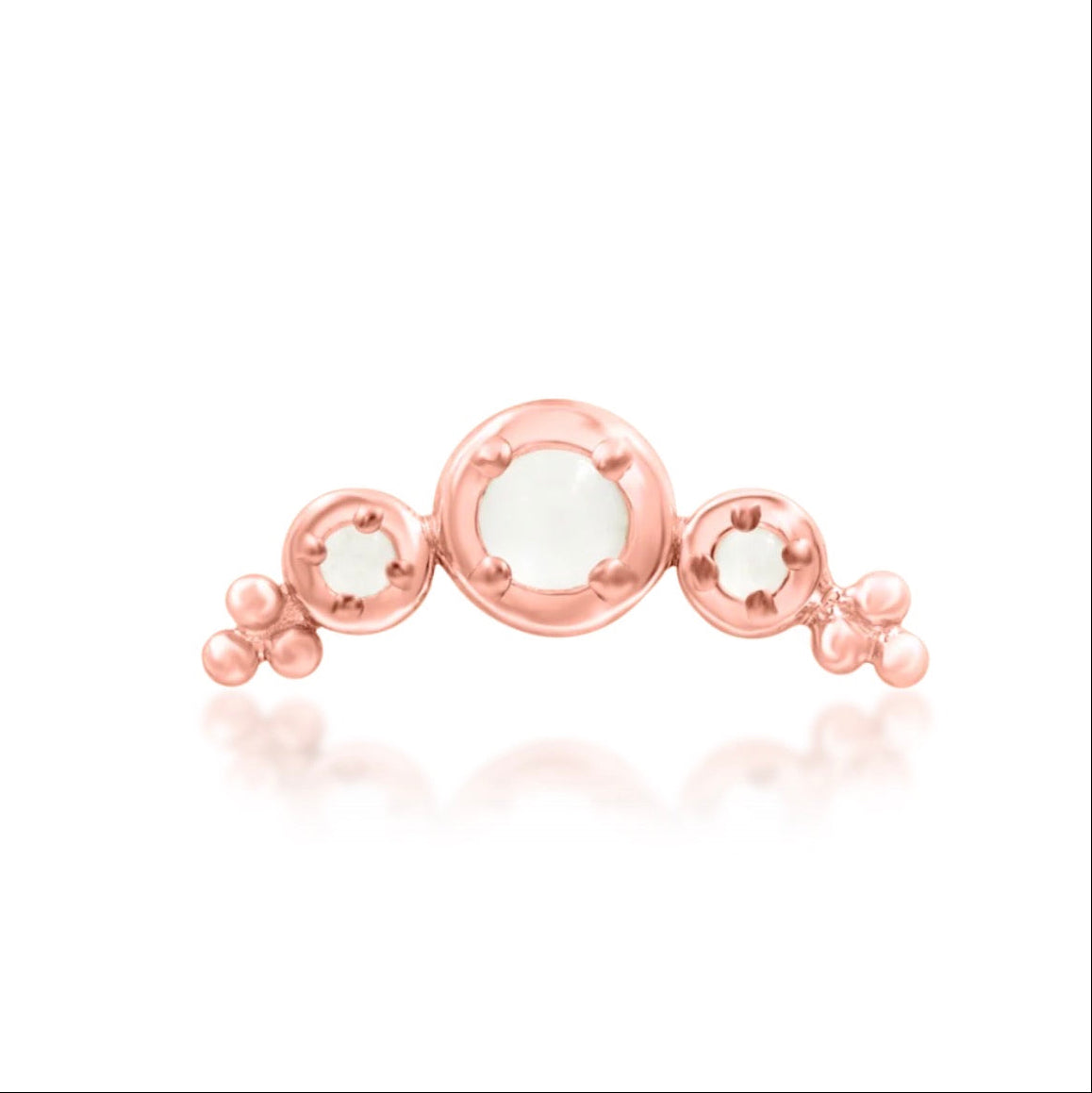 Moonstone conch jewellery in 14k rose gold, shaped in a curved arrangement designed to follow the ear.