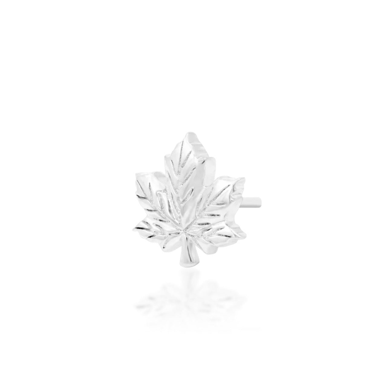 Nature-inspired helix jewellery in solid white gold with a textured three-dimensional leaf design.