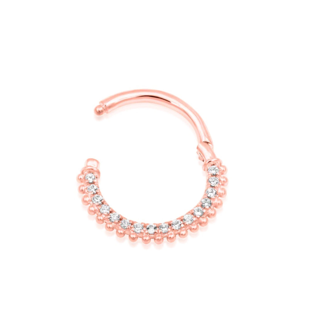 9mm gold clicker ring in rose gold with sixteen white cubic zirconia and a delicate beaded border.